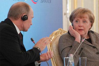 Путин и Меркель встретились за закрытыми дверями