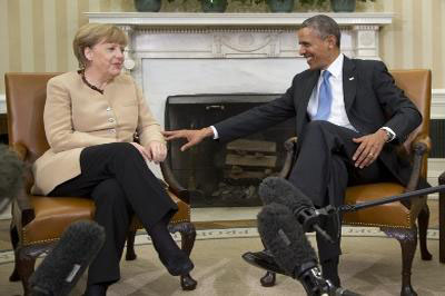 Барак Обама похвалил Меркель и пообещал снять санкции с России