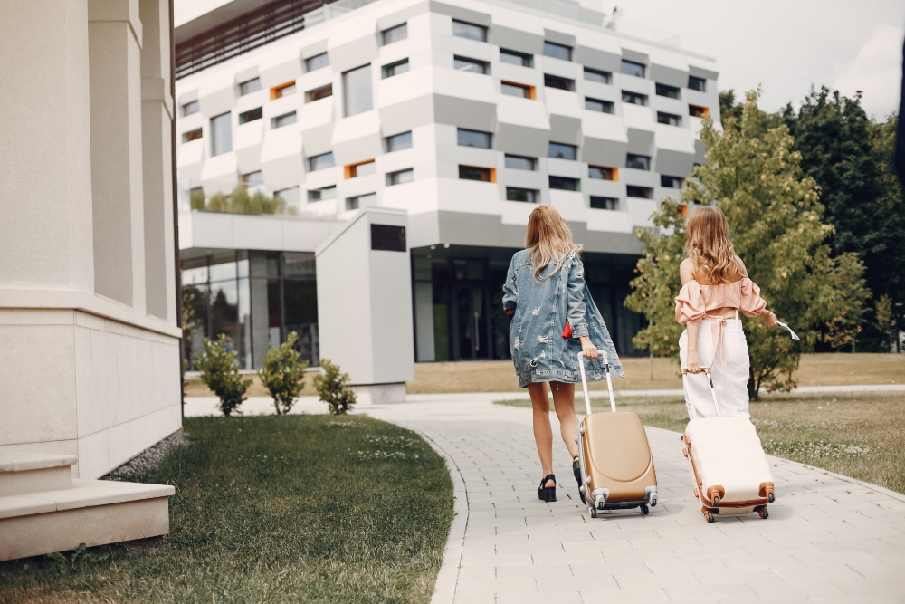two-beautiful-girls-standing-by-airport